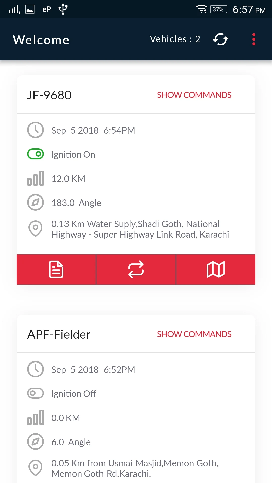 247 Track on Android in 2018: a customer's two vehicles, each with its last report, ignition, distance, heading and nearest landmark.